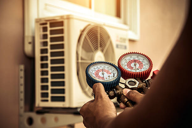 Professional Heat Pump Repair technician working in Drexel, NC